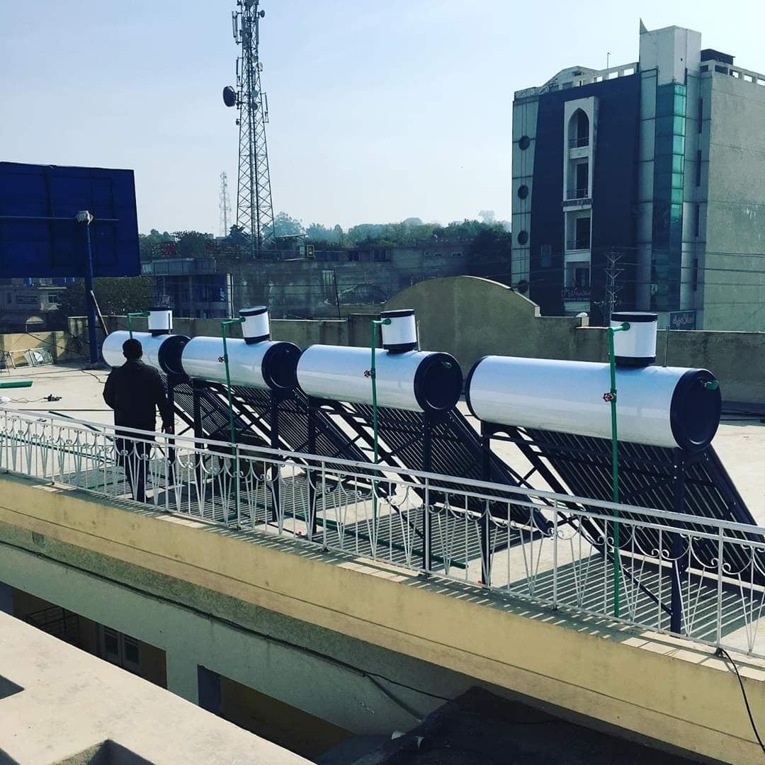 Bank of EIMEX solar geysers installed on a rooftop in Pakistan